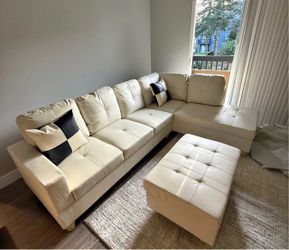 White leather sectional couch and Ottoman