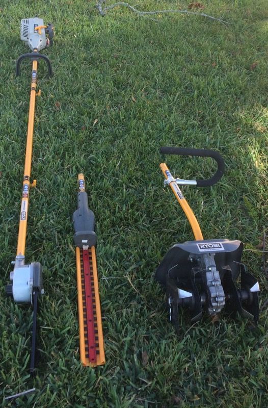 Ryobi EX26 Expandit with pole saw, hedge trimmer, tiller, brush cutter