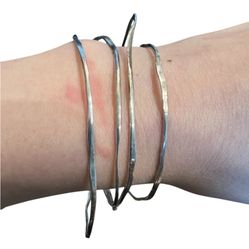 Four Silver Handmade Bangles 