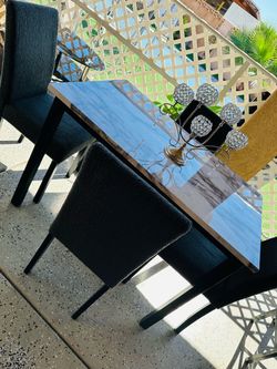 5-piece faux marble dining table set...