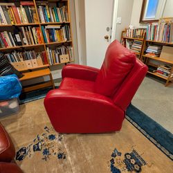 Red Italian leather swiveling rocking chair