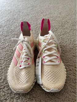 Pink Adidas running shoes