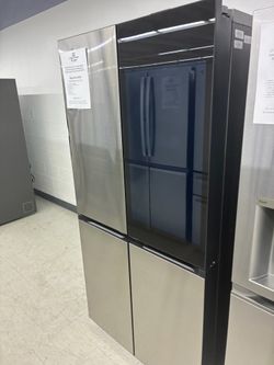 $3039 French Door Refrigerator Stainless Steel and Black