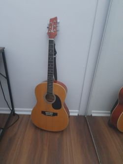 Acoustic Guitar Natural Wood Finish