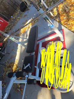 OLYMPIC WEIGHT BENCH  LEG EXTENSION  ADJUSTABLE INCLINE  AND  BAR HEIGHT.   7'  45LB BAR  WITH CLIPS 
11525 S  HALSTED DUNKIN DONUTS/7111.S WESTERN WA