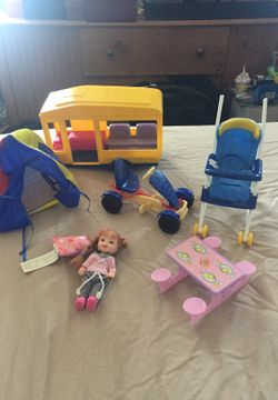 Kelly's camper with go cart and buggy