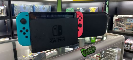 Nintendo Switch with Neon Joy-Cons and Carry Case