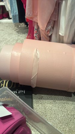 Three round pink organizing bin with lid