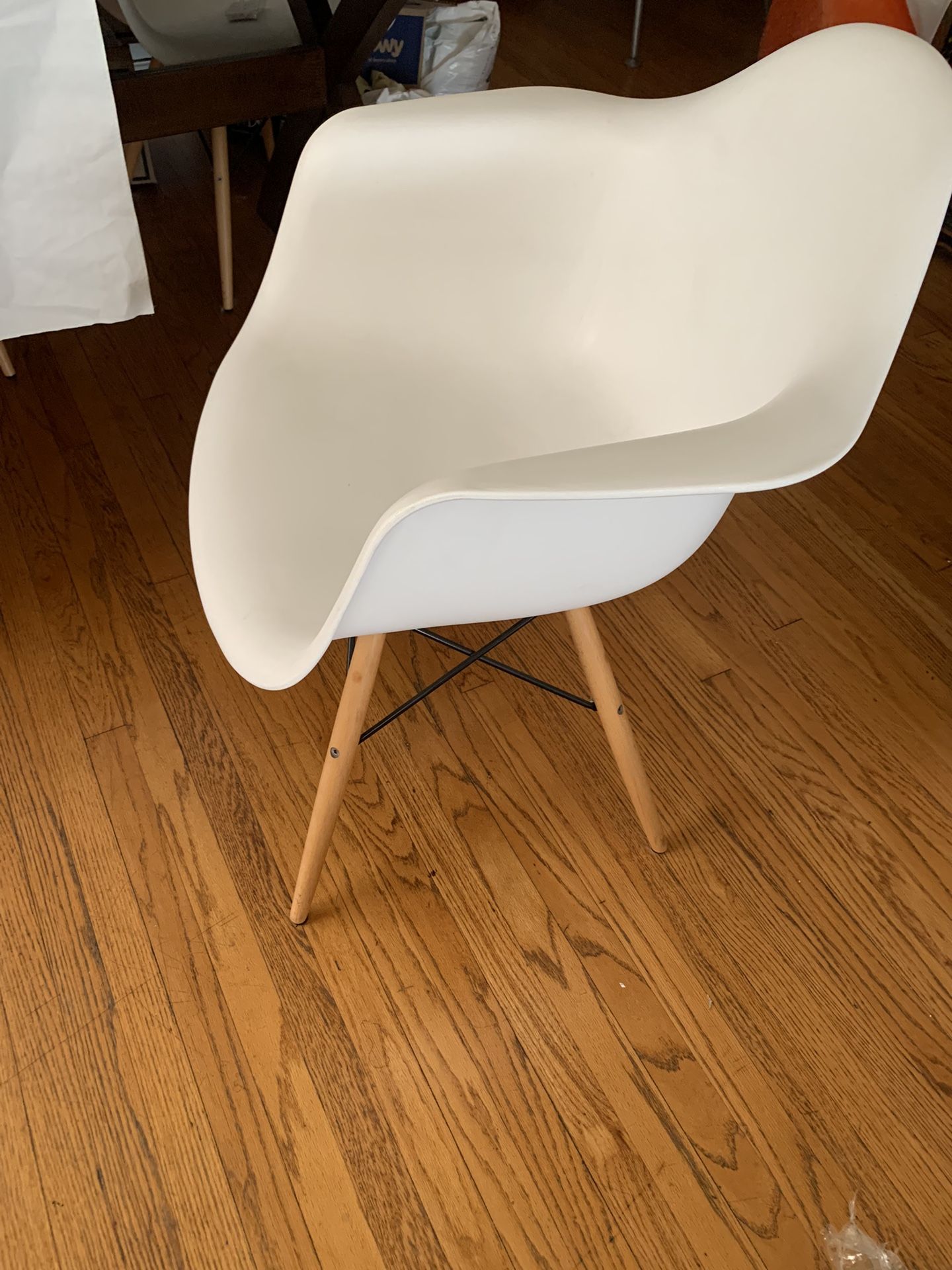 White Molded Chairs With Natural Wood Legs. Set Of 4