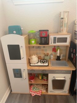 Toy kitchen with accessories