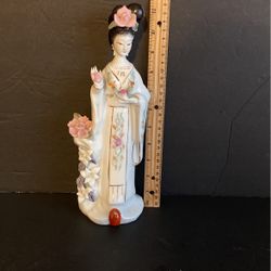 Beautiful tall oriental lady figurine