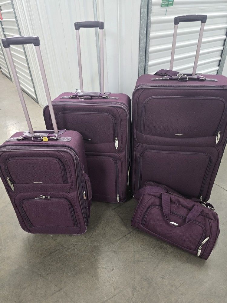 4 PC Pierre Cardin Expanding Wheeled Luggage