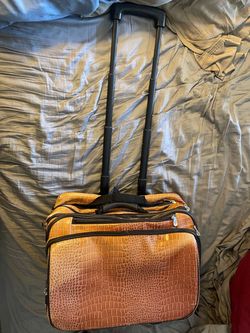 Crocodile or alligator embossed rolling travel bag or briefcase,