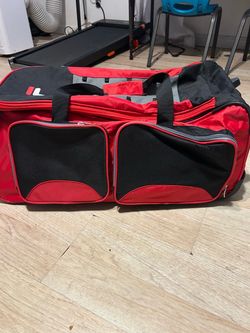 32” large lightweight fila rolling duffel bag.