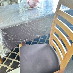 Solid oak table with 6 chairs