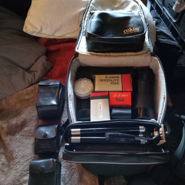 52mm Camera Lens In Back Pack Plus Tripod And Other Lens