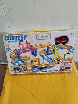 G.B. "Contest Dream of Track" DIY race track set featuring 52 colorful pieces, including a bridge and vehicles.