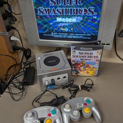 Silver/Platinum Nintendo GameCube With 2 Controllers (1 3rd Party), A Memory Card And Super Smash Bros Melee 