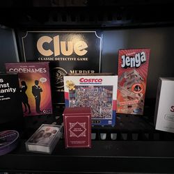 Games and Costco puzzle and giant Clue set with bottle