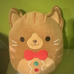 Squishmallows Jones the Gingerbread Cat plush with a Christmas bowtie Stuffed Animal