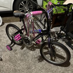 Two Children’s Bicycles Like New with Training Wheel Sets