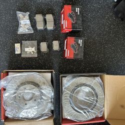BRAND NEW ROTORS AND BRAKE PADS 350z/G35