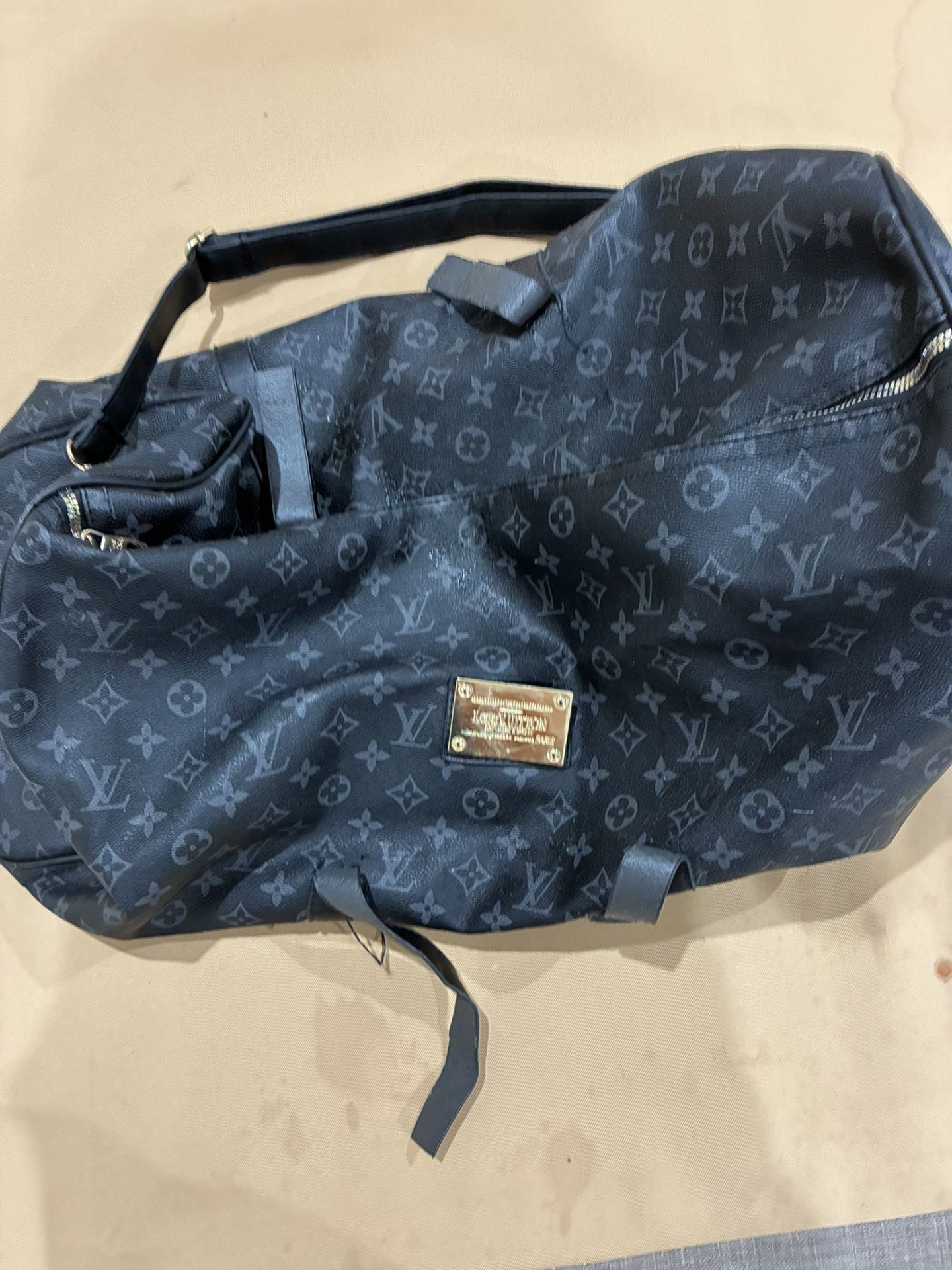 Vintage Busted Louis Vuttion Duffle 