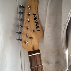 First Act Guitar 