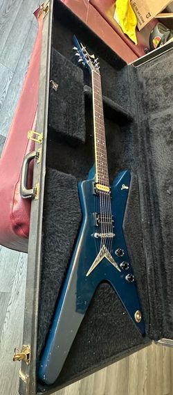 1981 Dean USA ML Dark Blue Dimebag Darrell Pantera electric guitar. Has quite a bit of playing where around the edges. But it is in very good conditio
