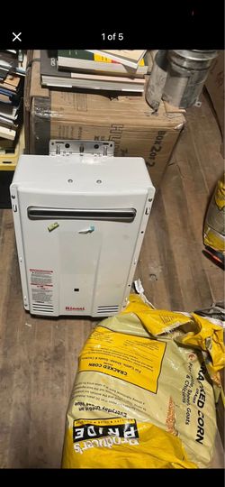 Tankless hot water heater natural gas never installed still new
