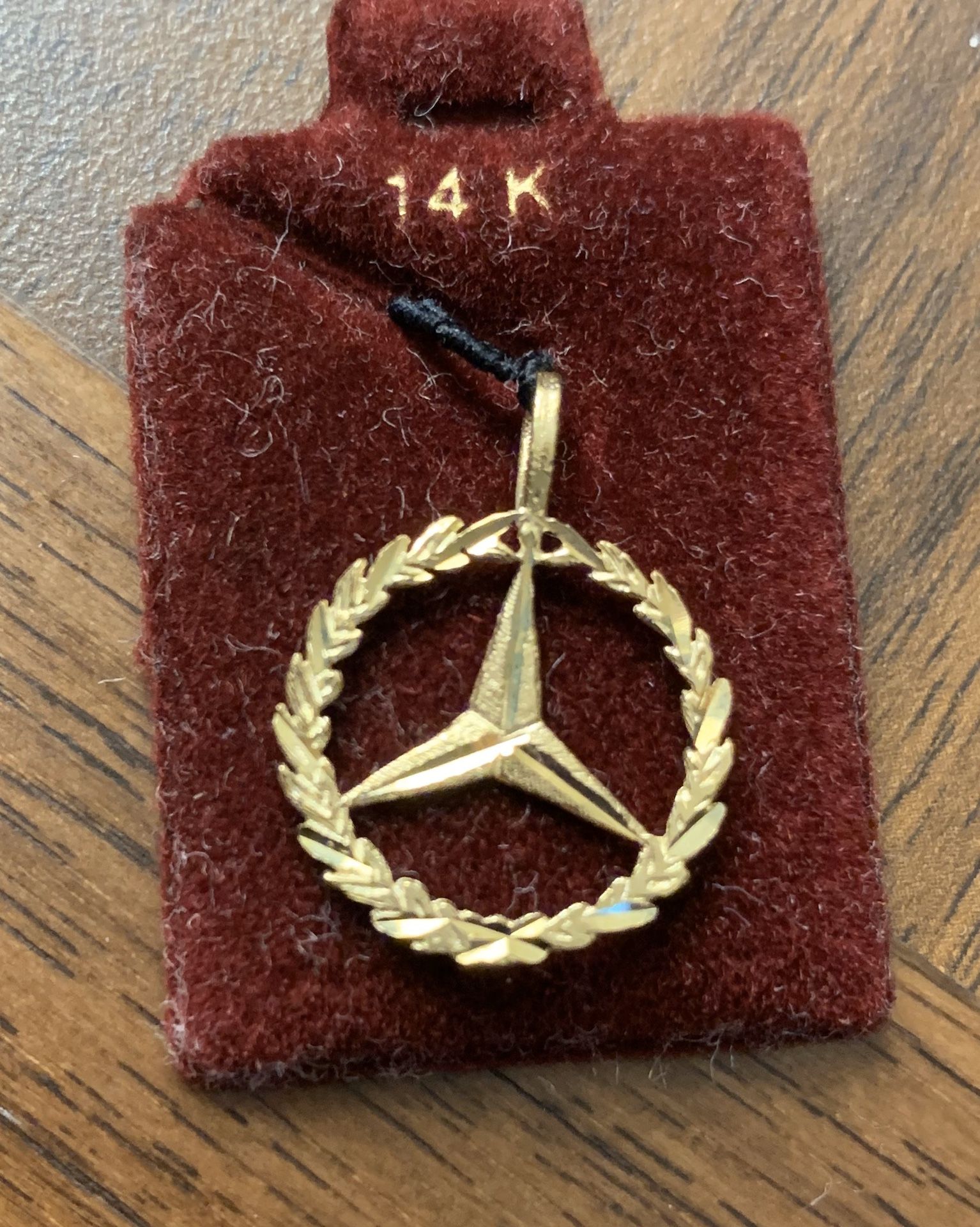 mercedes-benz 14k Gold Charm or pendent