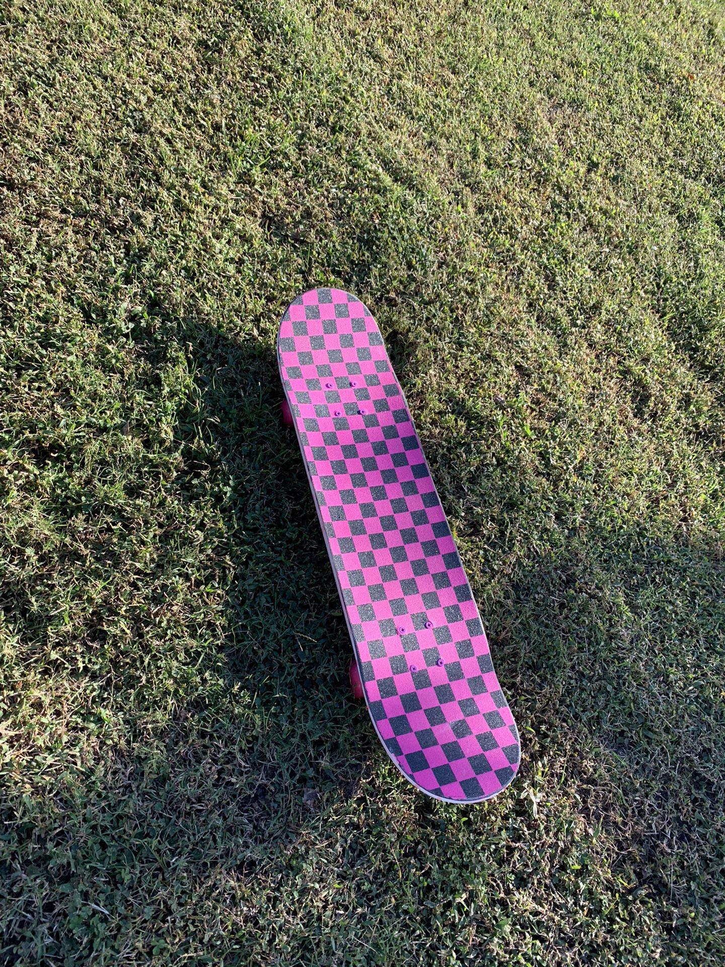 Nice Pink And Black Checkered Skateboard