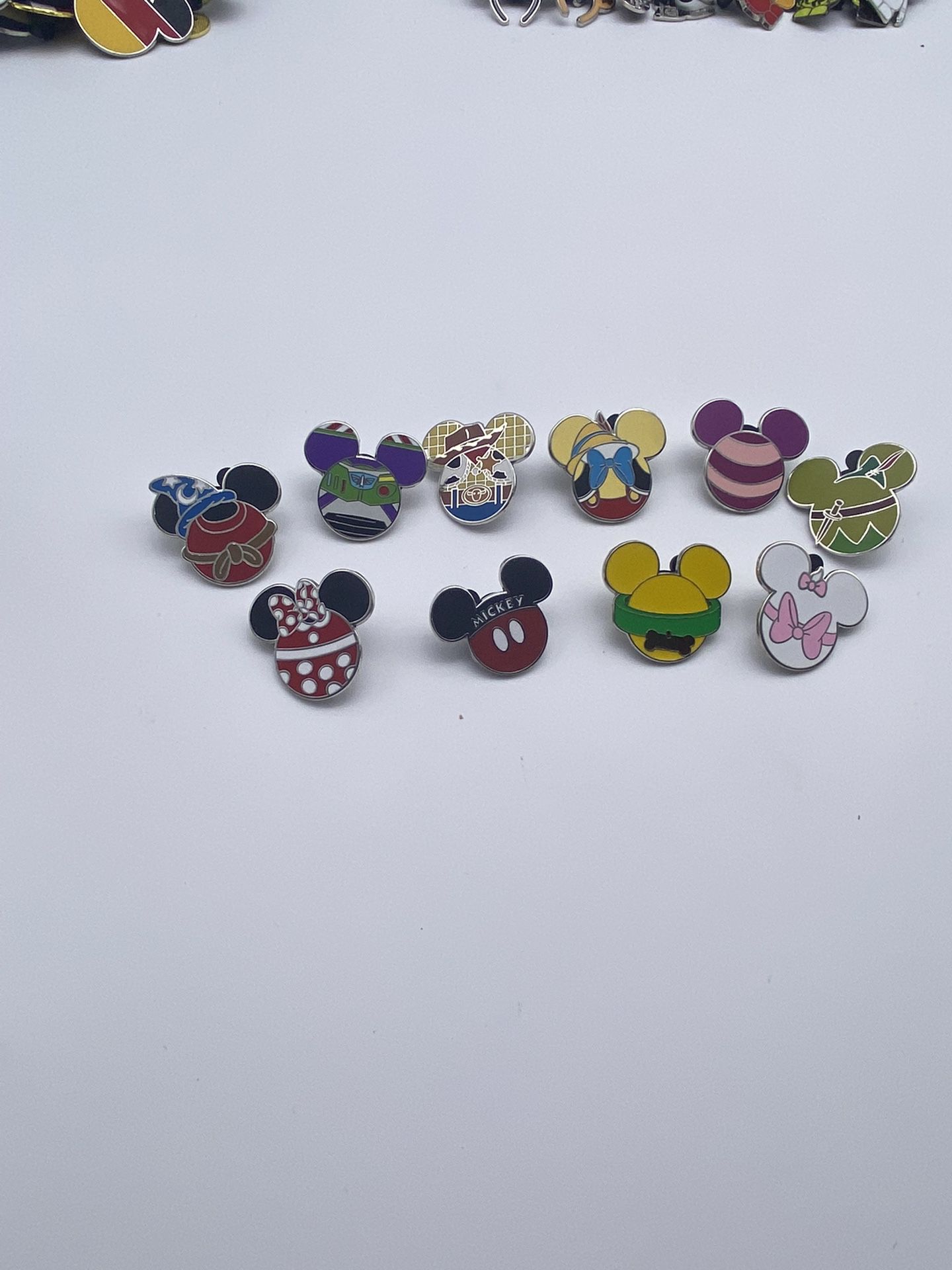 10 Disney Mickey Character Icon Mystery pin Cheshire Cat Disney Pin Bundle   Sorcerer Mickey Cheshire Cat Minnie Mouse Pluto Marie Buzz Lightyear Wood