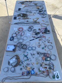 Lots of costume jewelry/ old pins