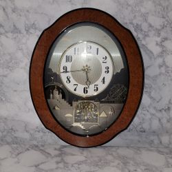 Rhythm "Small World" Magic Motion musical wall clock