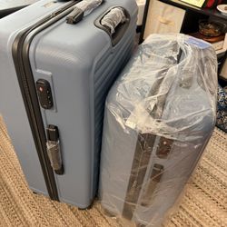 2 Piece Luggage Set, New, 4-Wheeled.