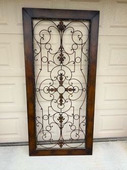 Tuscan iron framed wall grill