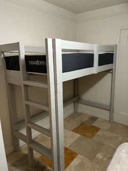 Cama individual elevada