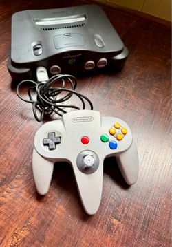 Nintendo 64 with Red Expandion Pak & Controller with rumbler