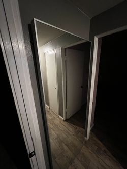 Floor Mirror With Crack On The Bottom Right