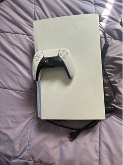 PlayStation 5 with controller