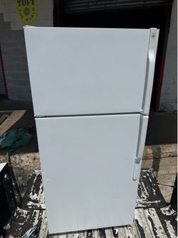 28” Ge top freezer bottom refrigerator