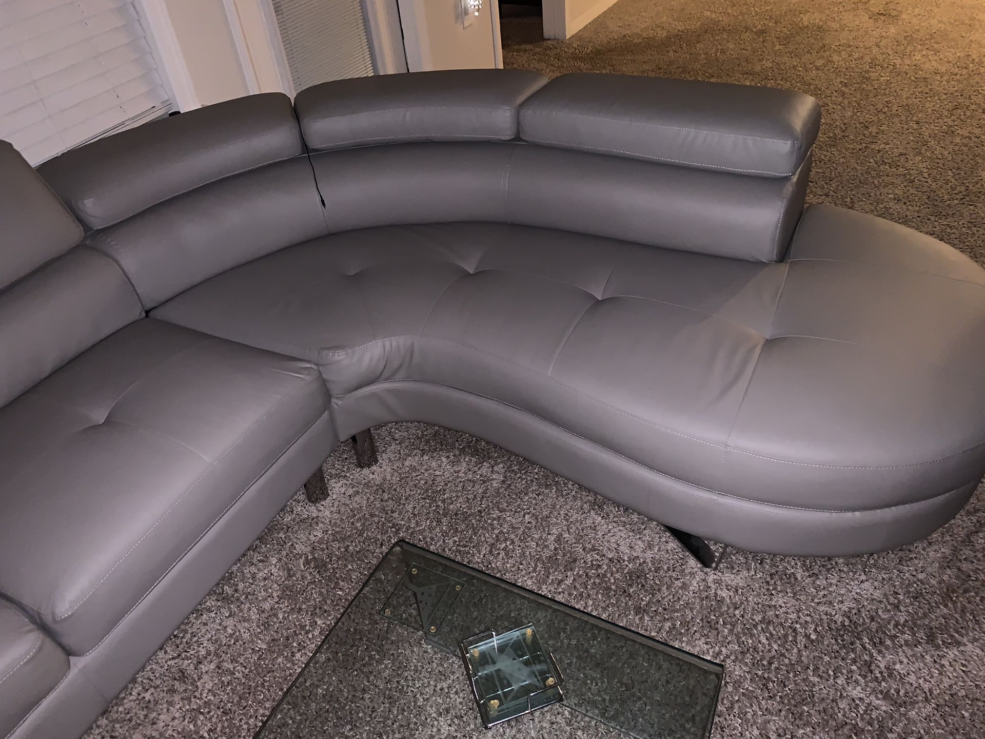 Leather Sectional w/glass coffee table