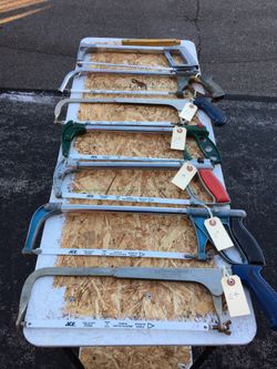 Lot of 12 hacksaws with spare blades, case and supplies