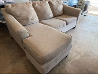 Ashley Furniture 2 pcs sectional sofa with hideabed