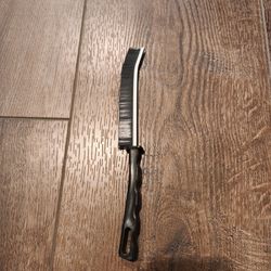 new black crevice cleaning brush for narrow gaps and corners,