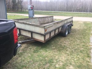 Photo 6x16 double axle trailer with extra rim and tire plus ramps
