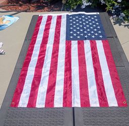 American Flag with Embroidered Stars .  Brand New 59" Long X 35 1/2"  Tall