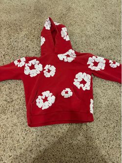 Red denim tear