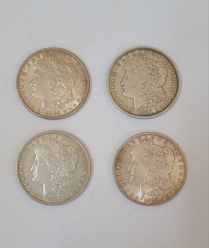 4 MORGAN SILVER DOLLARS ~ Will Consider Reasonable Offers.